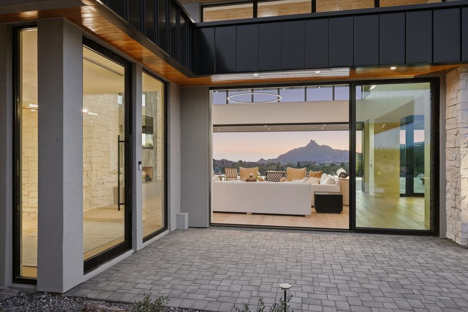 Twilight exterior with mountain vista